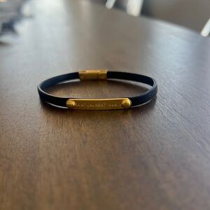 SMALL Saint Laurent Paris engraved black leather and gold ID bar bracelet